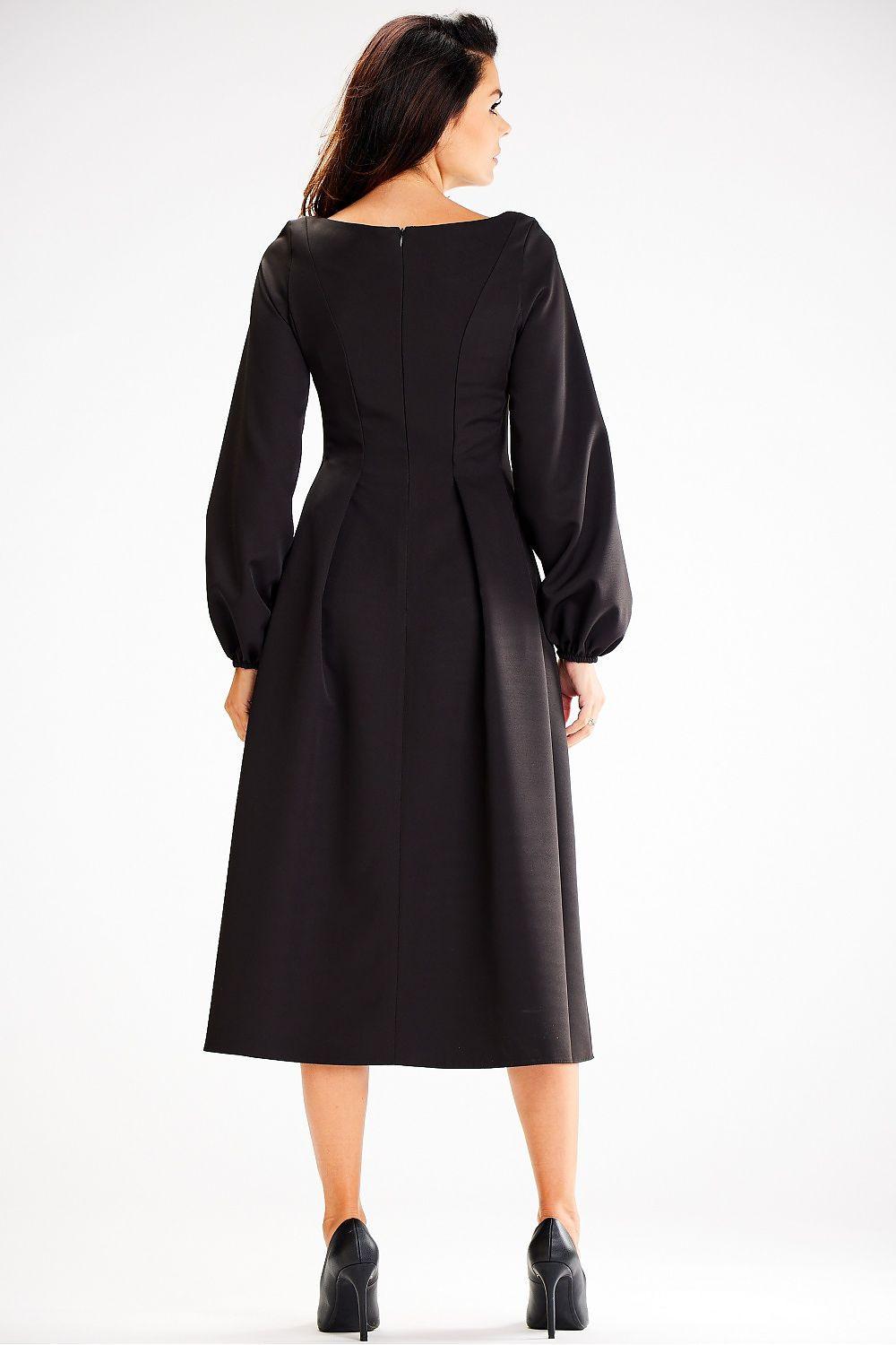 Black midi day dress, back view, long puff sleeves, pleated A-line skirt