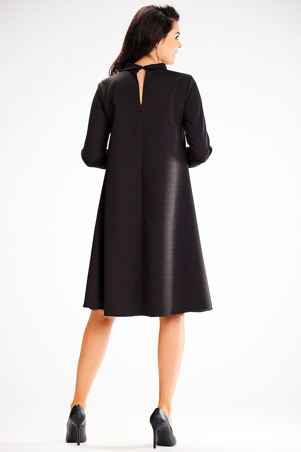 Black day dress with back keyhole opening, long sleeves, A-line midi skirt