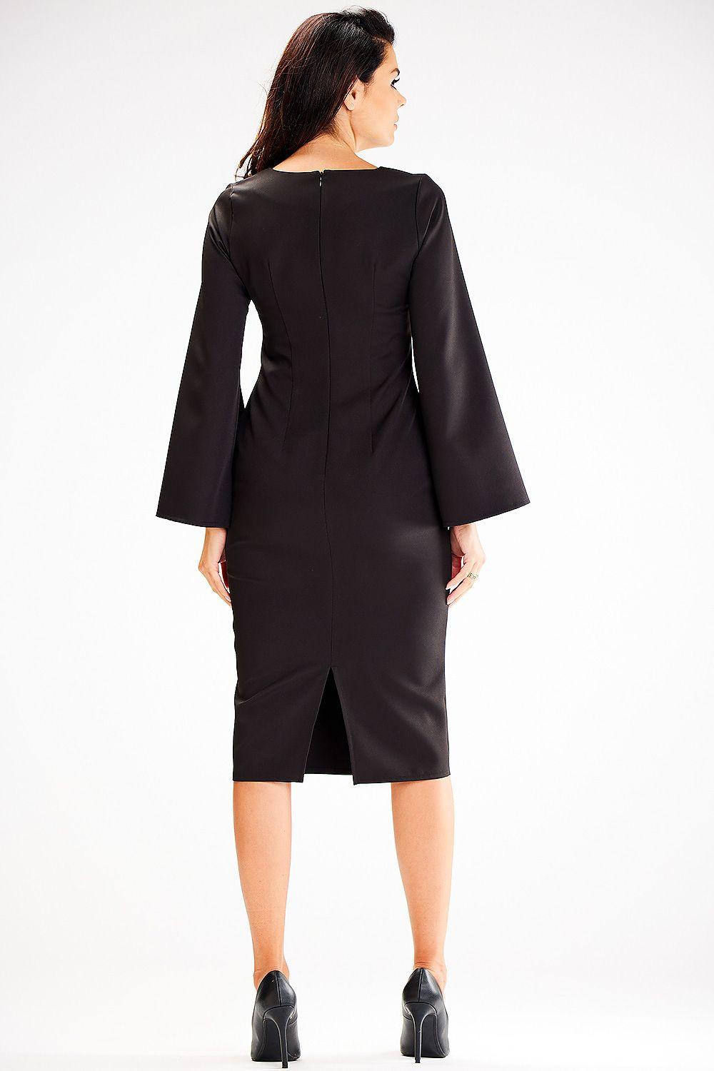 Black cocktail dress, back view with flared slit sleeves and knee-length hem