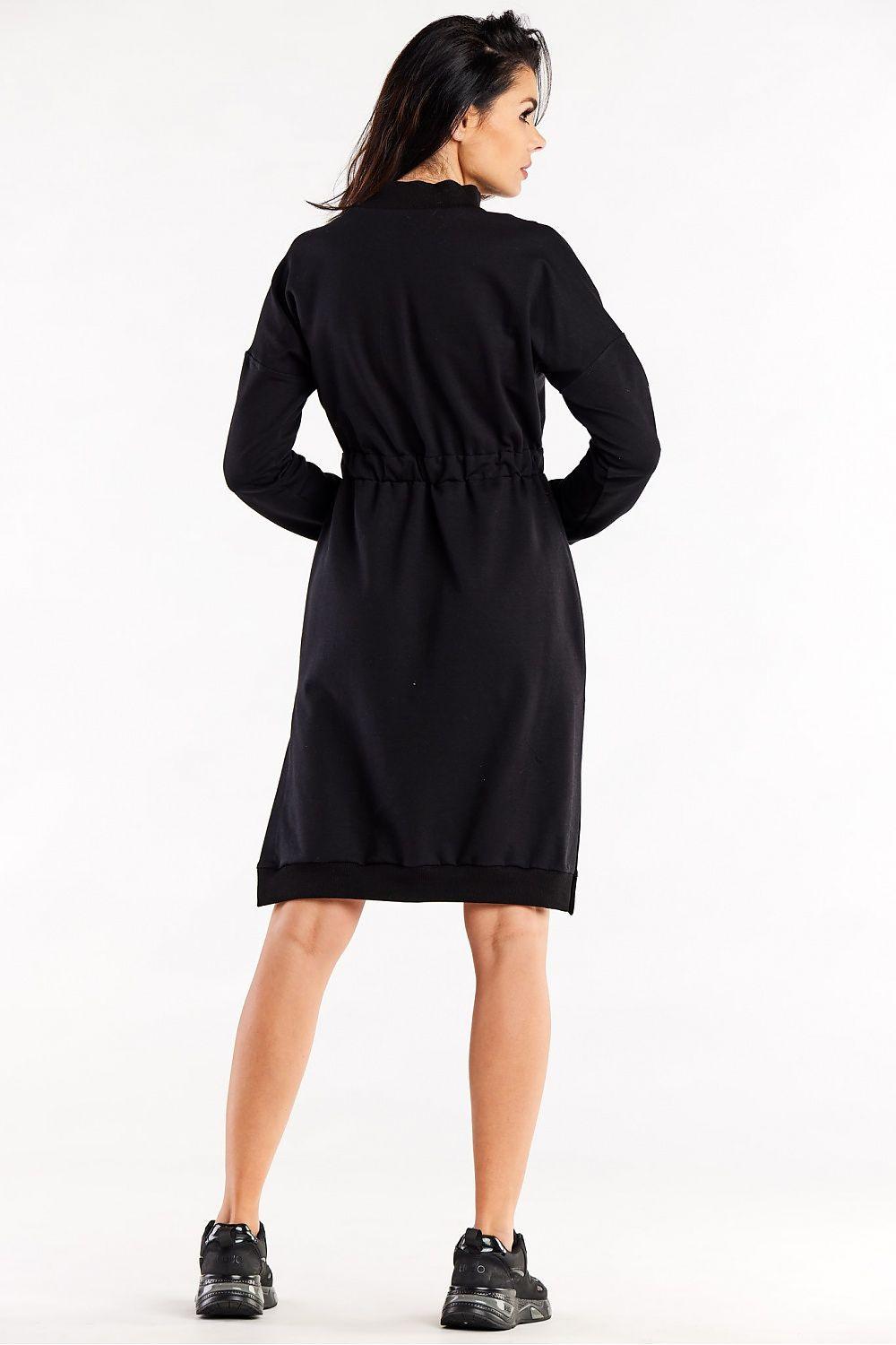 Black daydress back with long sleeves and gathered waist, side slit hem