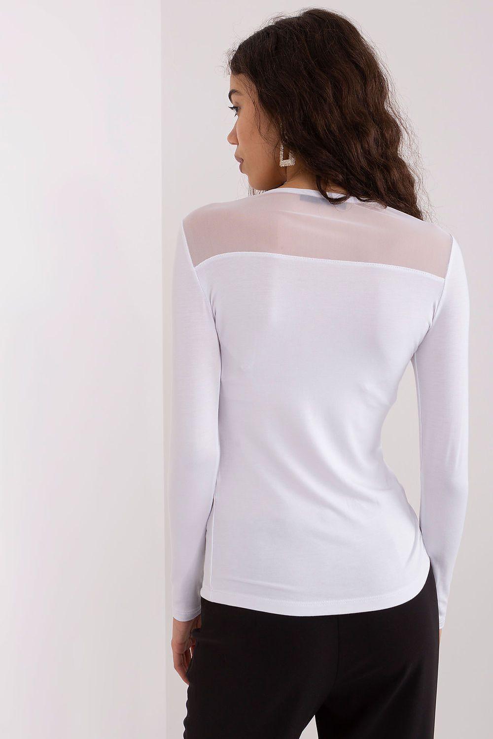 White long-sleeve blouse with sheer back yoke and fitted cut