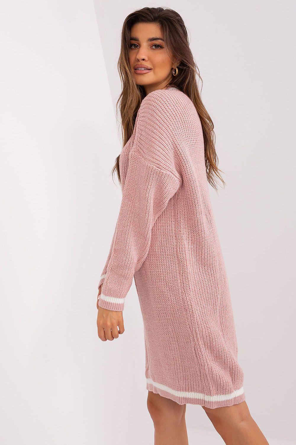 Pink knit daydress with V-neck, long sleeves, side view, white ribbed trim