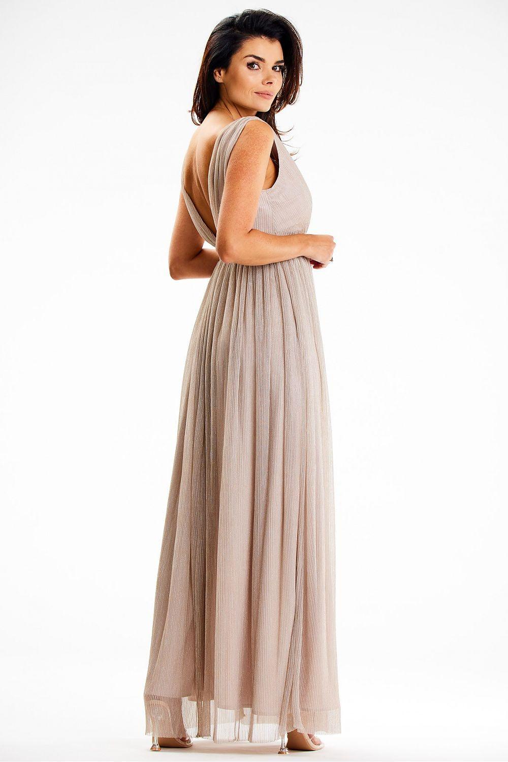 Beige shiny mesh maxi dress from side, sleeveless with V-neck wrap bodice and long skirt.