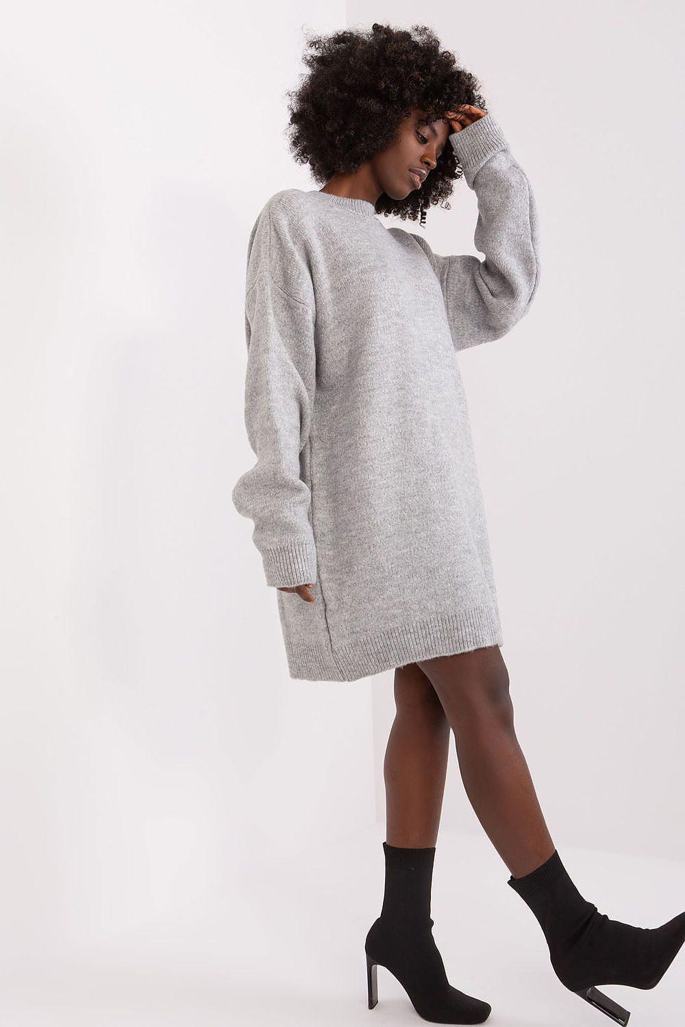 Grey knit daydress with long sleeves and crew neckline, slightly loose fit