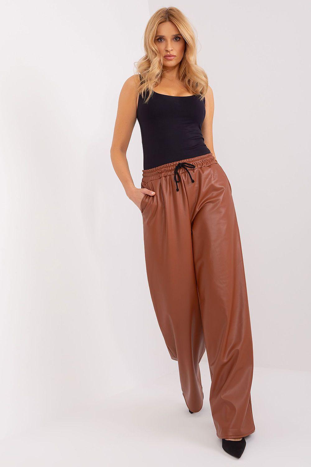 High-waist brown eco leather trousers with drawstring waist, relaxed wide-leg fit