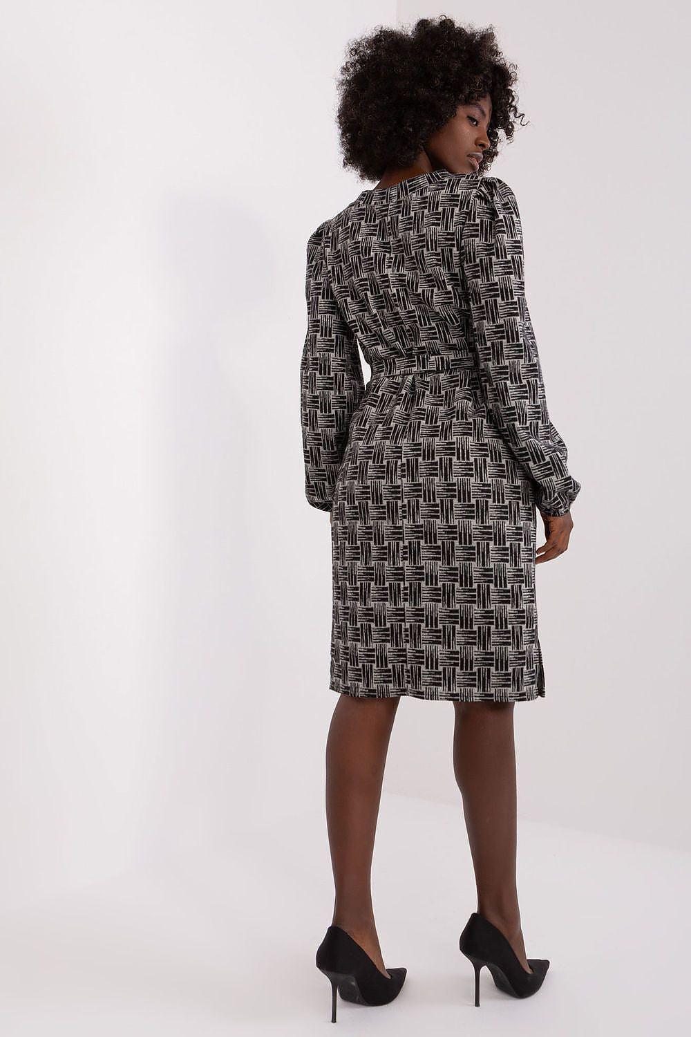 Dark geometric long-sleeve daydress, crew neck, straight hem, side/back view