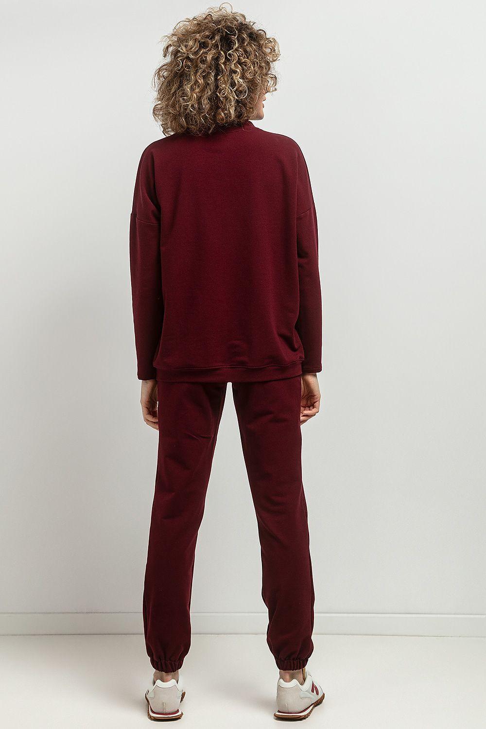 Tracksuit trousers in burgundy with relaxed tapered leg and cuffed ankle