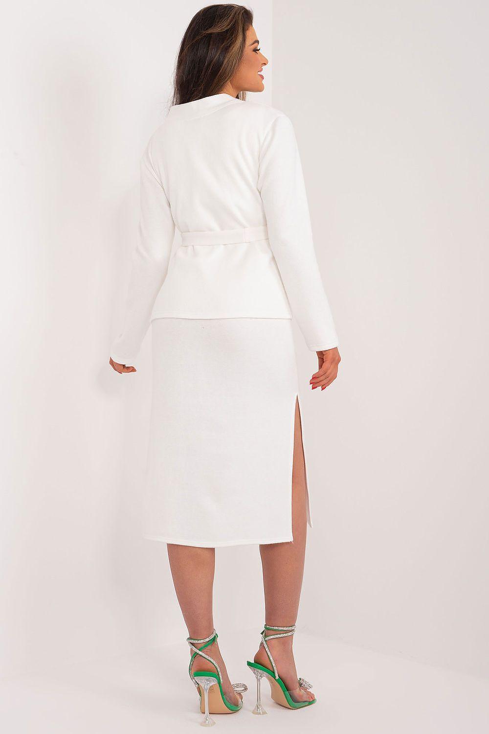 Women's white two-piece outfit, tie-waist blouse and midi skirt with center back seam