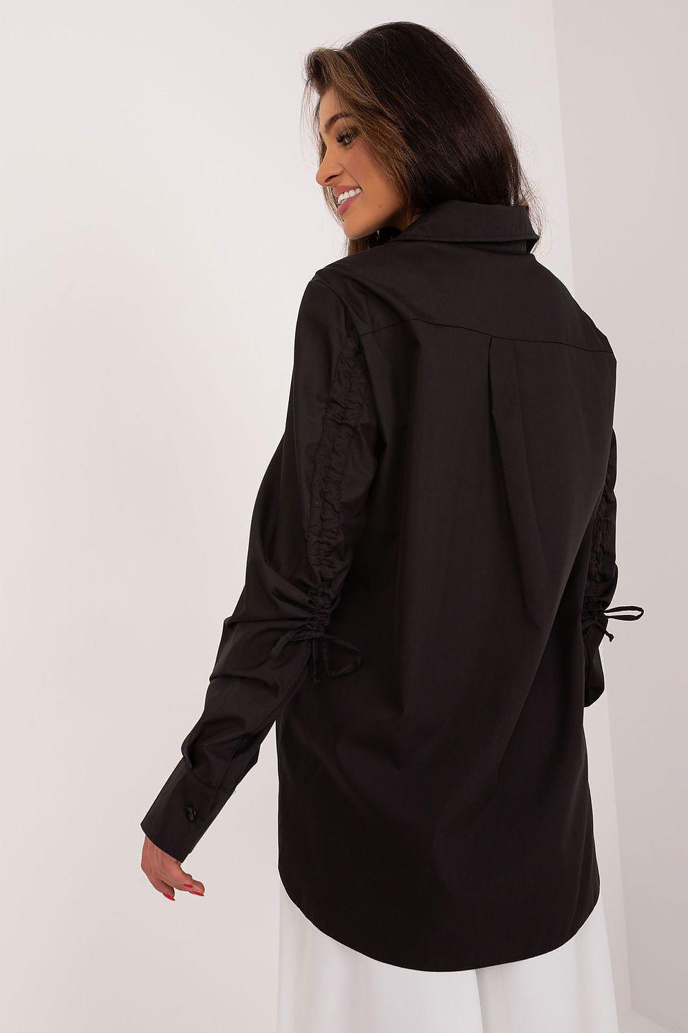Lakerta long sleeve shirt in black, back view with collar and button-front