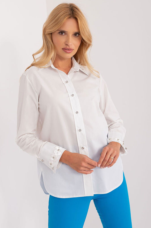 White long-sleeve cotton shirt with button-front, pointed collar, and embellished cuffs