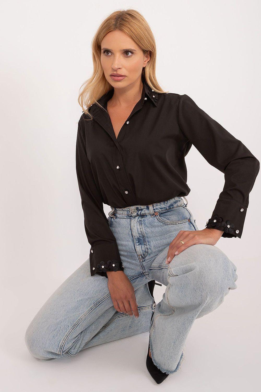 Black long-sleeve button-up shirt with pointed collar and buttoned cuffs