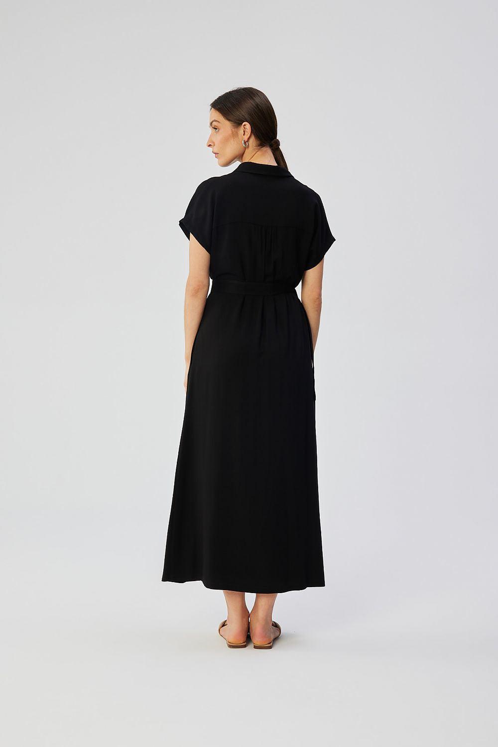 Black daydress with short sleeves and waist tie belt, back view.