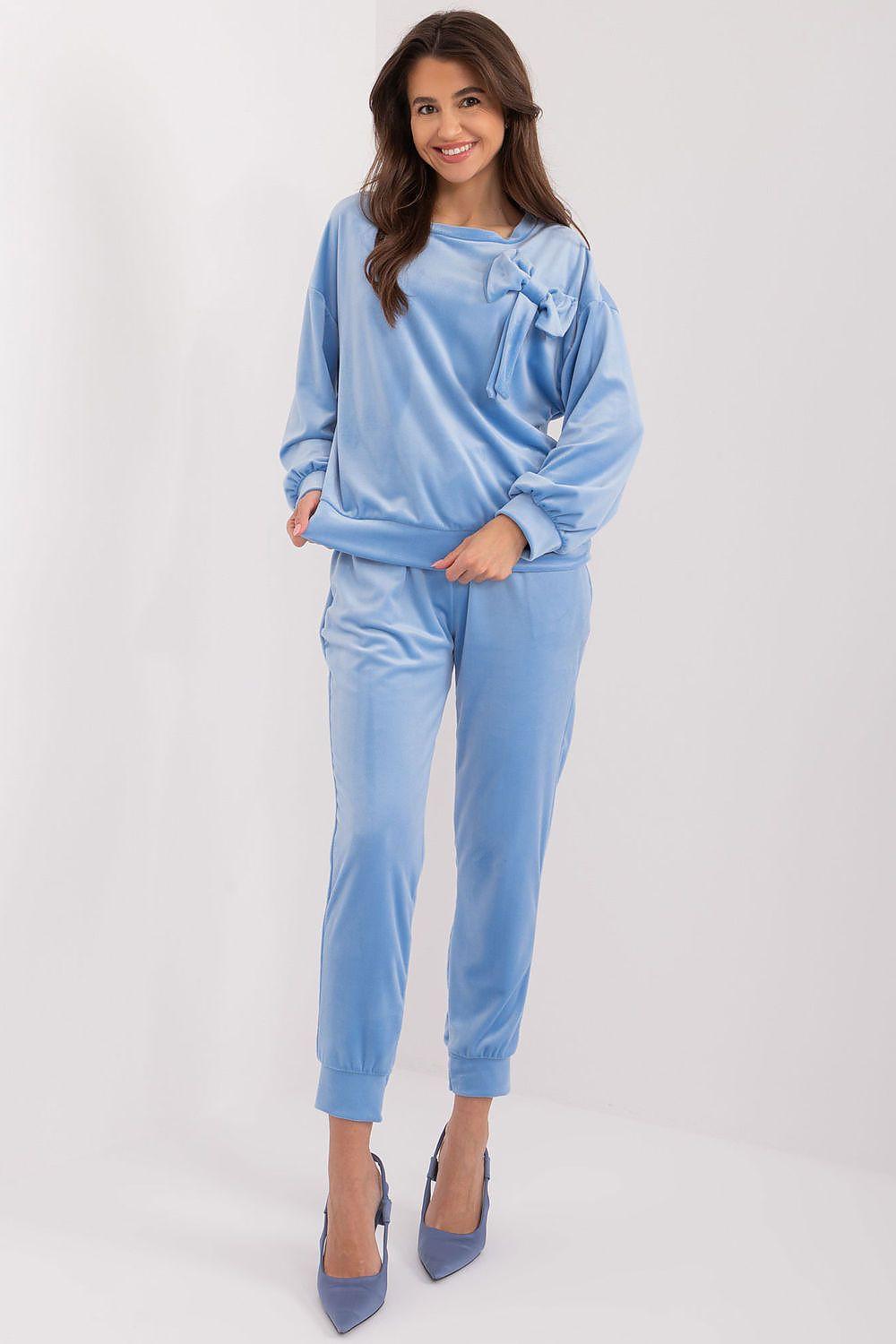 Blue velour lounge set with sweatshirt and high-waist joggers, adjustable tie waist