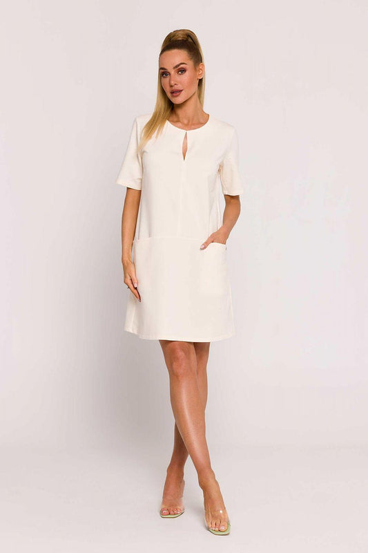 White short-sleeve day dress with keyhole neckline and above-knee straight skirt