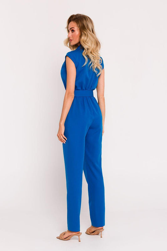 Blue sleeveless jumpsuit with V-neck and waist tie belt, side view