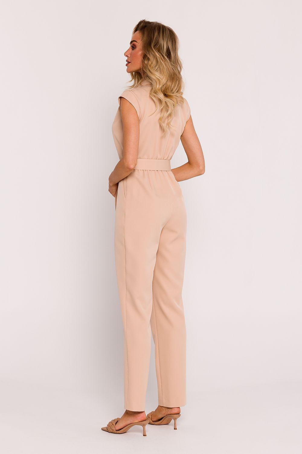 Beige sleeveless jumpsuit with V-neck and belted waist, long straight pants