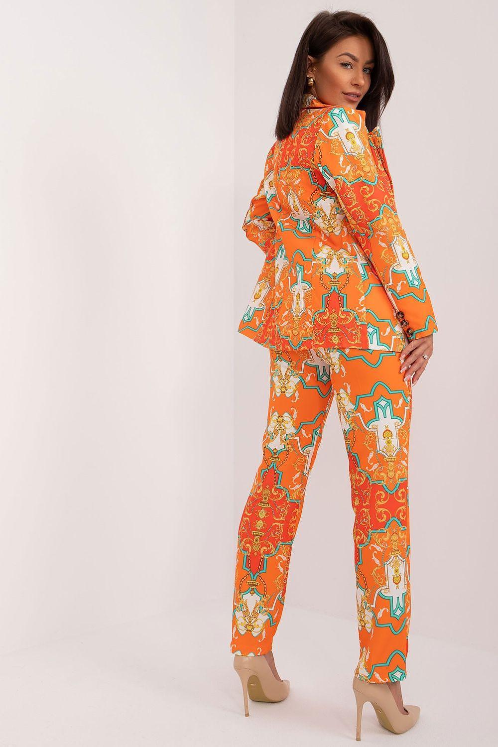 Orange patterned jacket and wide-leg trousers set, front three-quarter view