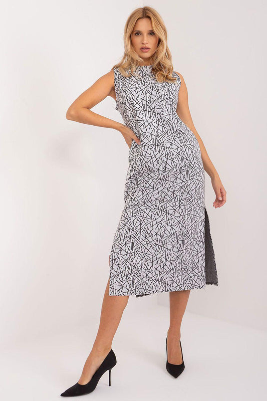 Grey midi dress with abstract line pattern and side slit, fitted waist