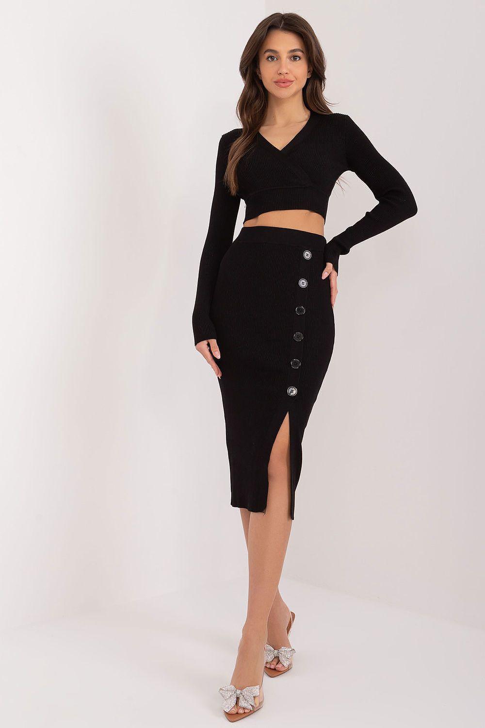 Black knit set with cropped V-neck sweater and button-front midi skirt