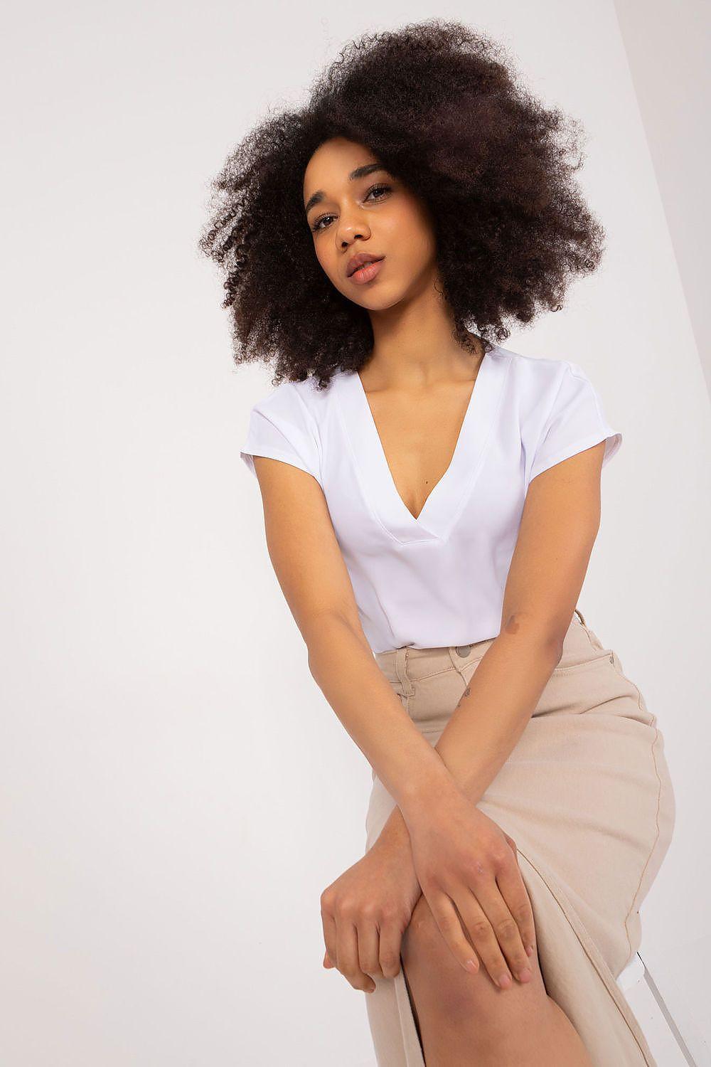 White V-neck short-sleeve blouse with gathered neckline and relaxed fit