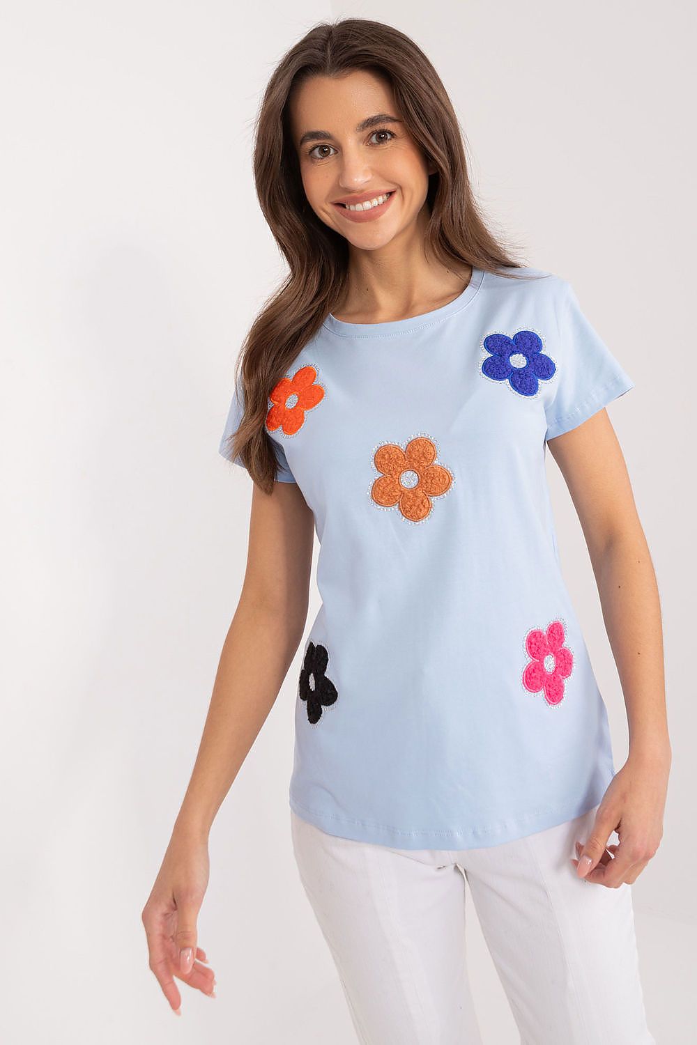 Light blue cotton blouse with short sleeves and multicolor floral appliqué patches