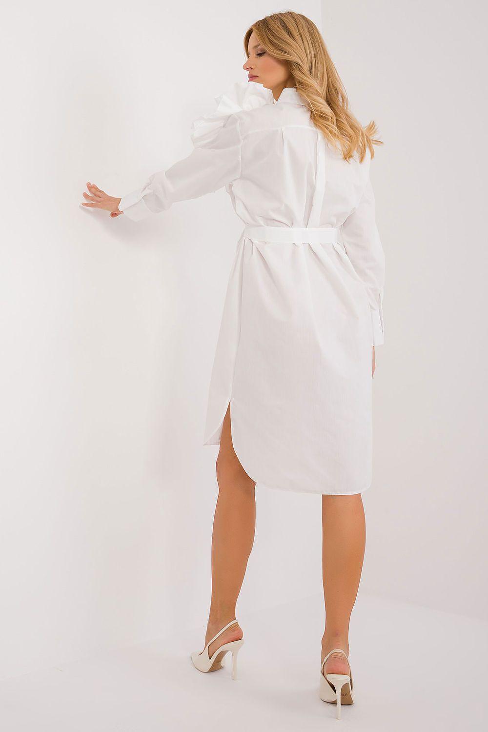 White belted shirt dress with ruffled neckline and long sleeves, knee length