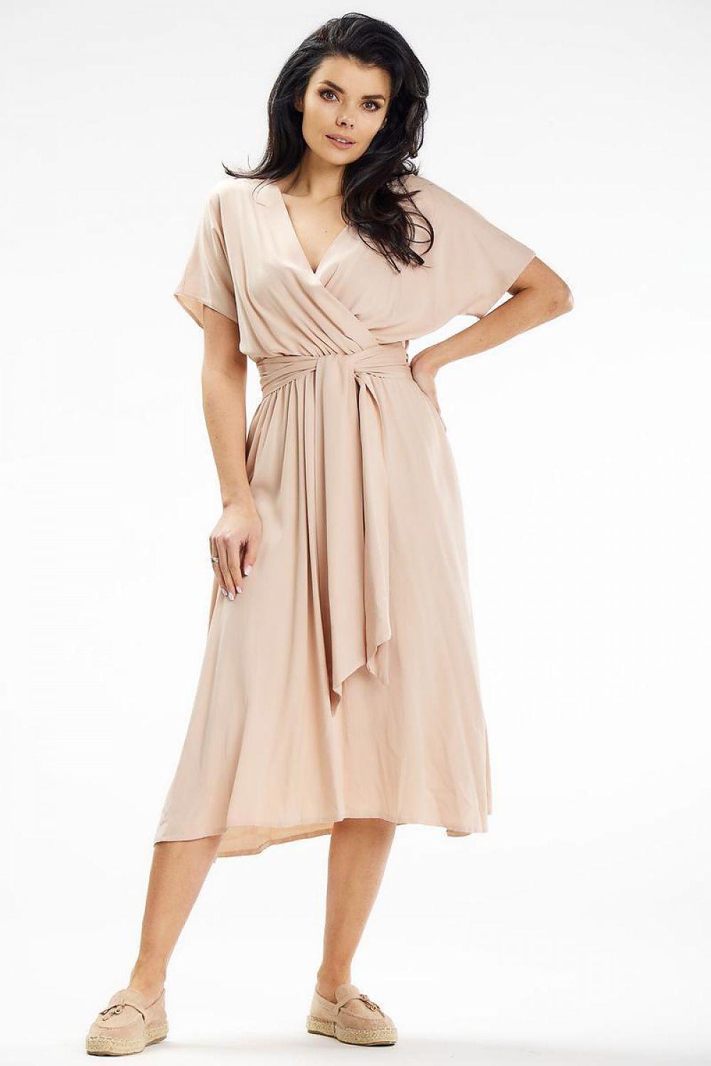 Awama daydress in beige with short sleeves, V-neck wrap front and tied waist.