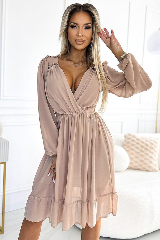 Beige V-neck cocktail dress with gathered waist, long sleeves, tiered hem