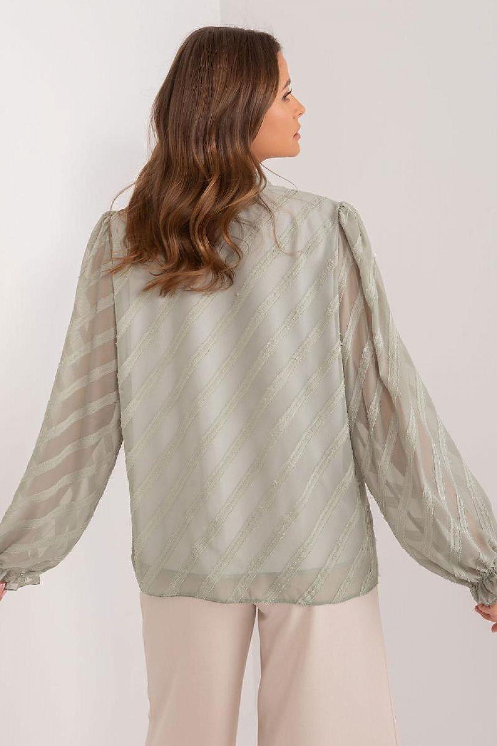 Light green long sleeve shirt with striped pattern and balloon sleeves