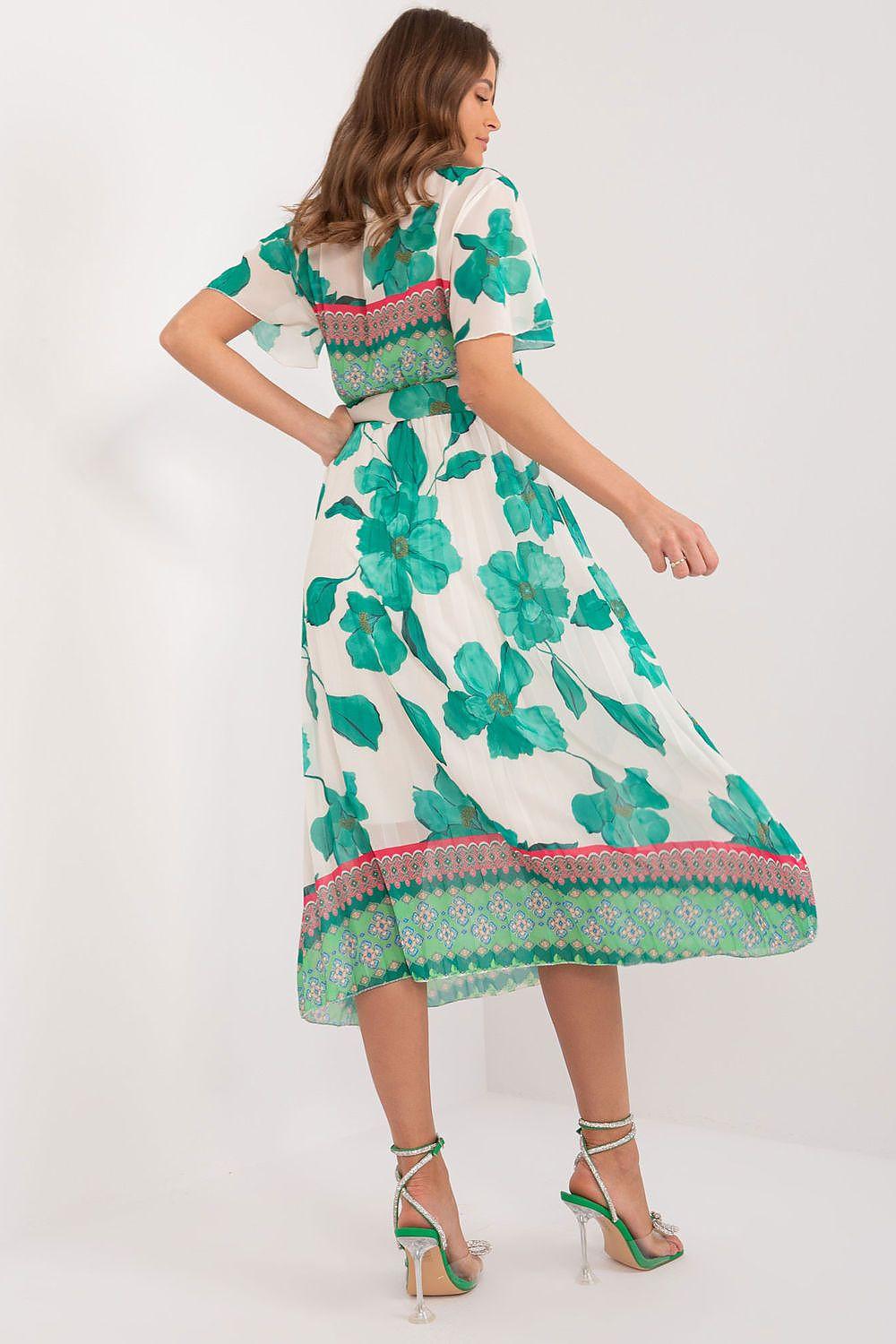 Green floral daydress with short sleeves and V-neck wrap style, midi length