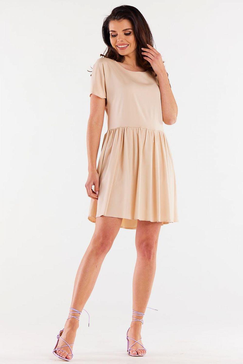 Beige short-sleeve daydress with gathered waist and flared skirt