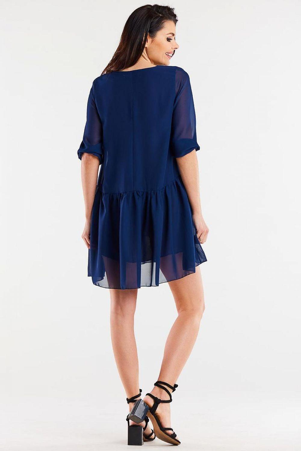 Navy V-neck daydress with three-quarter sleeves and tiered back skirt