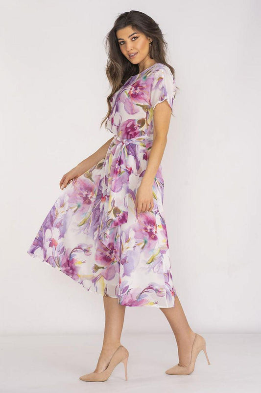 Floral daydress with short sleeves and a tied belt, knee-length skirt in violet tones.