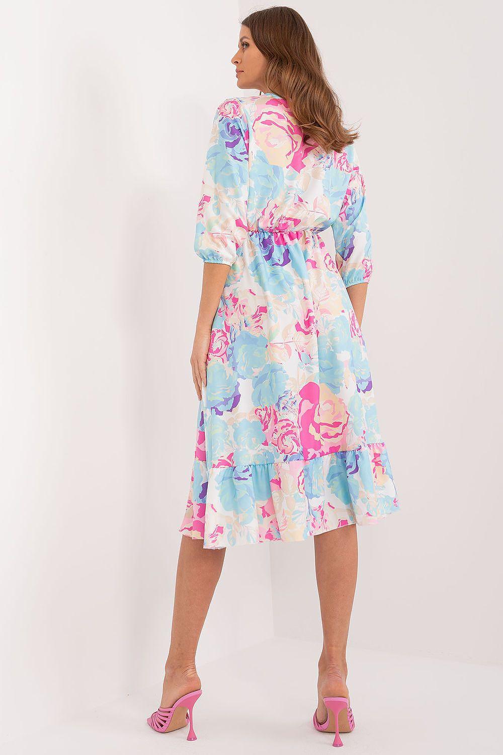Light blue and pink patterned daydress with ruffled tiered skirt, back view