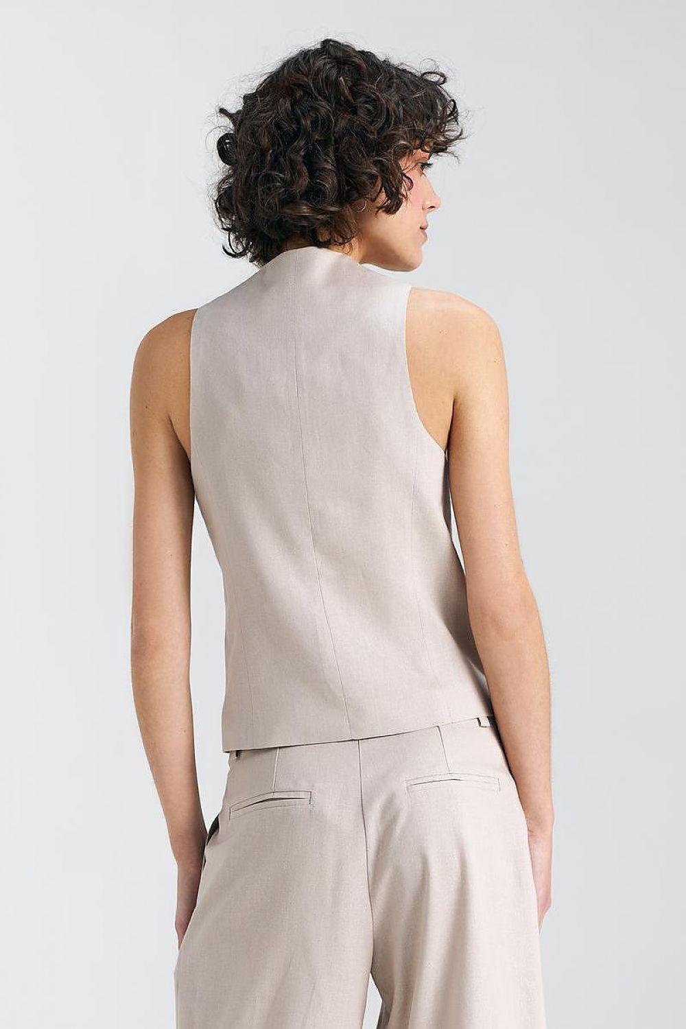 Back view of beige linen-blend gilet vest with scooped back and curved hem