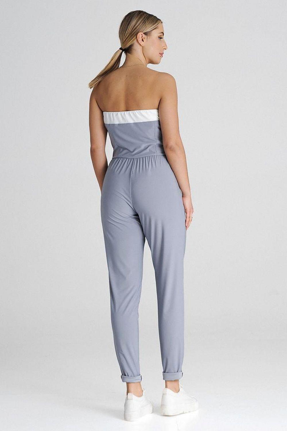 Strapless light blue jumpsuit with white bandeau trim and gathered waist