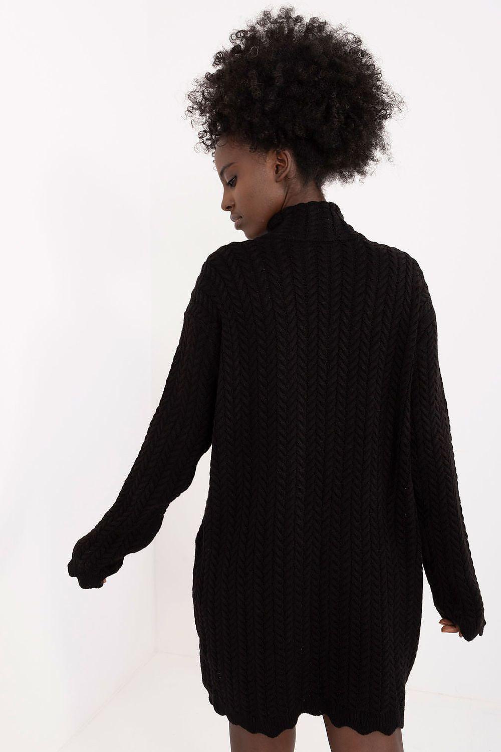 Black long-sleeve knitted daydress with textured chevron pattern
