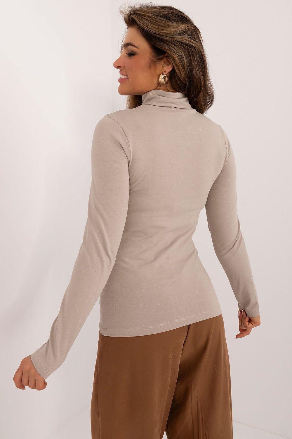 Beige fitted turtleneck blouse, back/side view with long sleeves