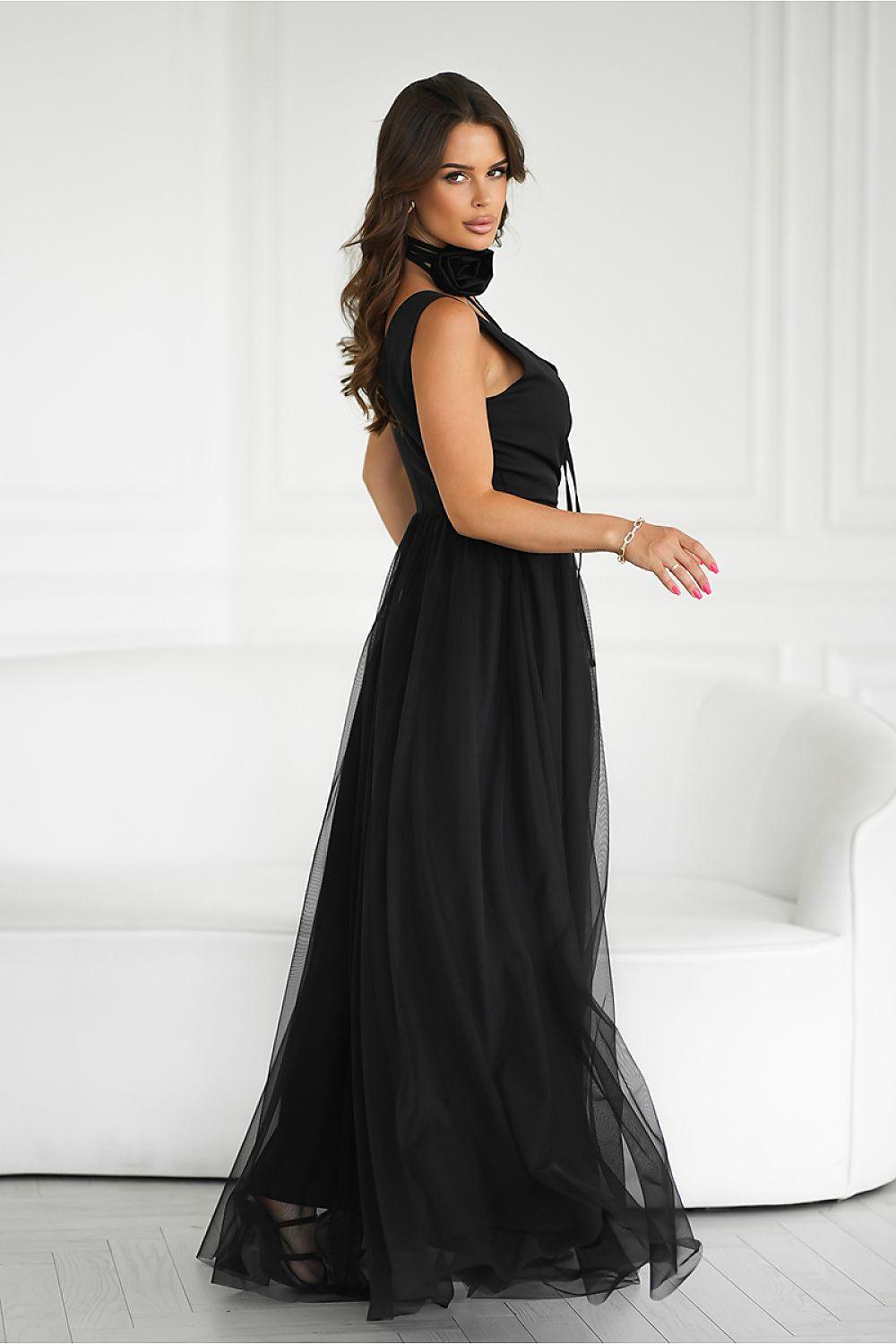 Sleeveless long black dress with high-neck V style, gathered waist, flowing tulle skirt.