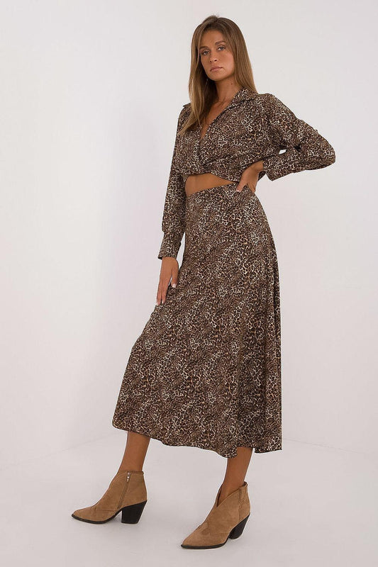 Brown patterned midi skirt set with long-sleeve wrap-style crop top and belt