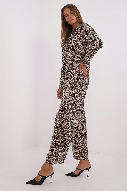 Animal print high-waist wide-leg pants, beige and dark, side view with matching top