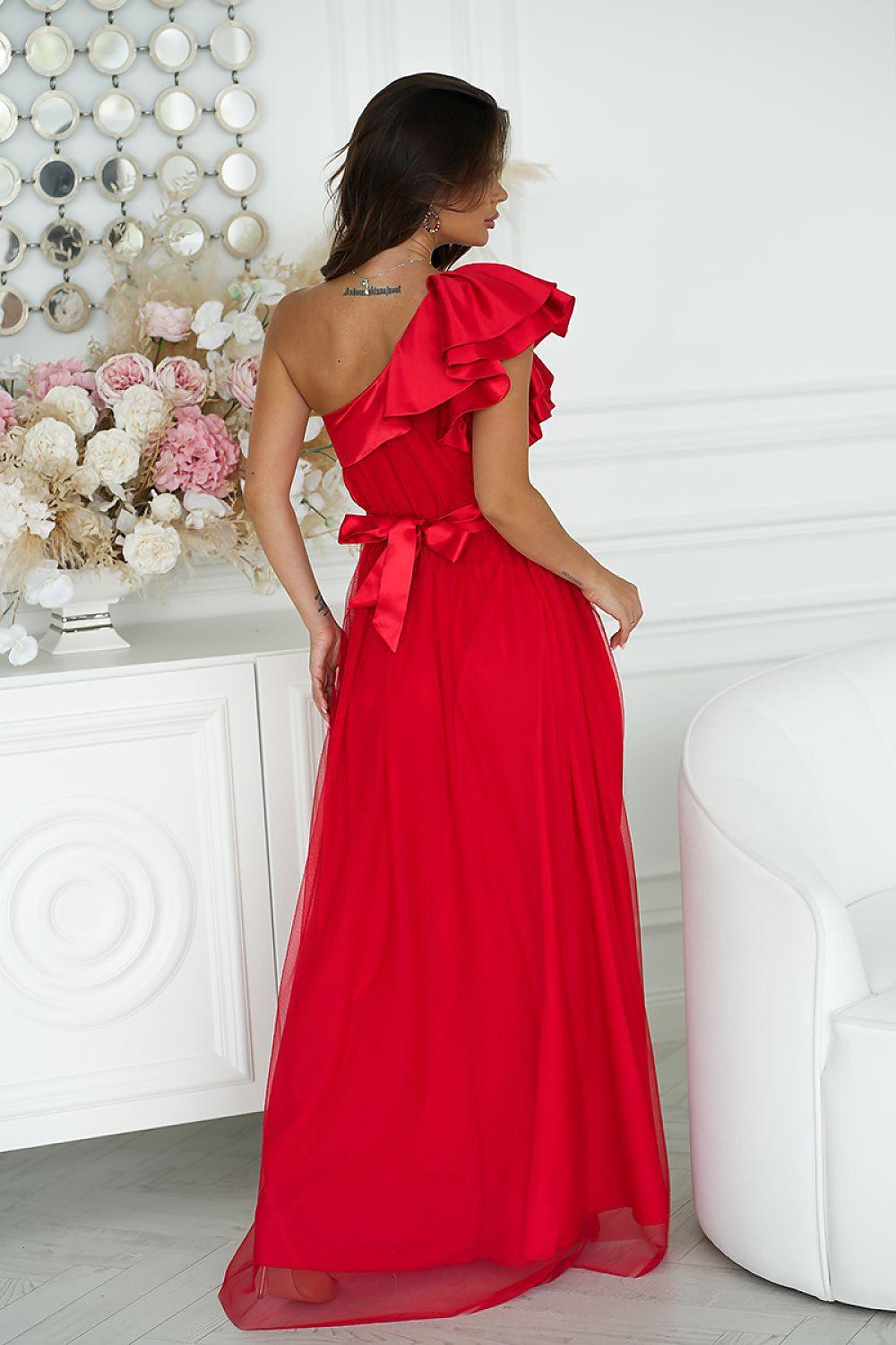 Bicotone long dress in red from back view with ruffled shoulders and flowing maxi skirt.