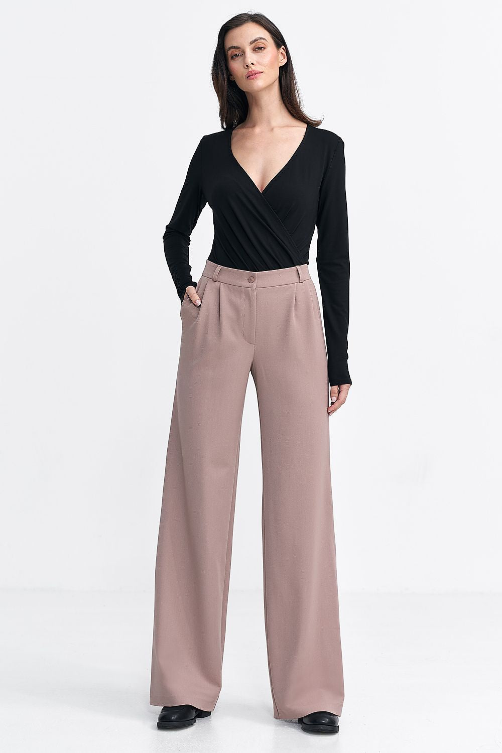 Beige high-waisted wide-leg trousers with button waistband, relaxed fit