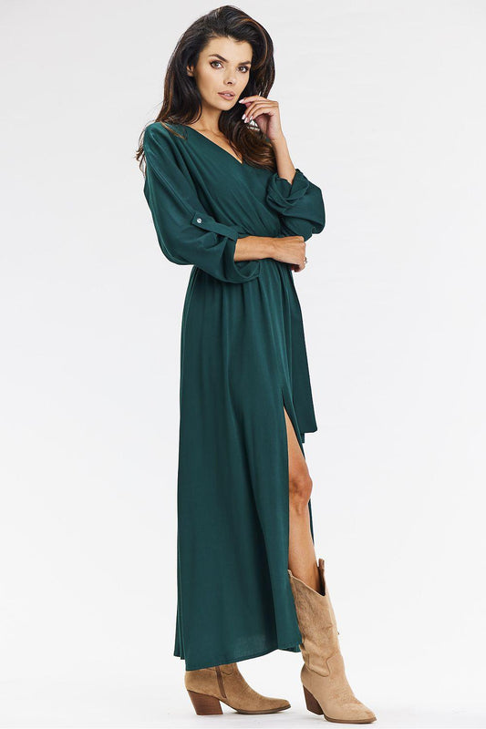 Green V-neck daydress with long balloon sleeves, gathered waist tie, side slit skirt
