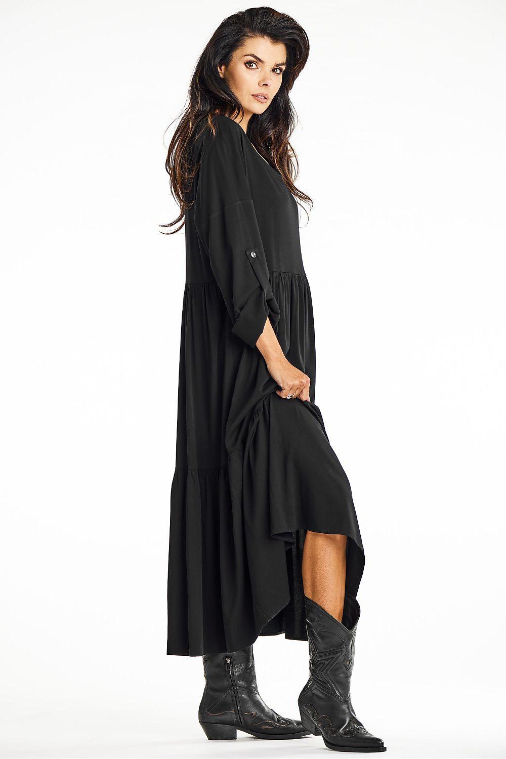 Black V-neck tiered daydress with elbow sleeves, loose fit, gathered waist, midi hem.