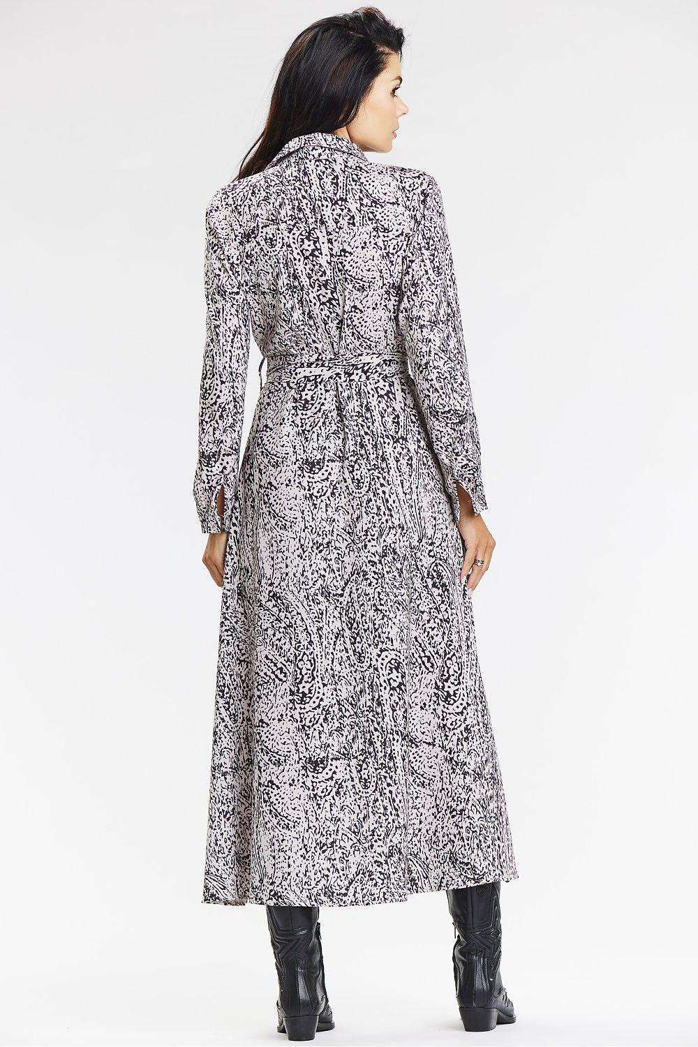 White and dark patterned daydress back view with long sleeves