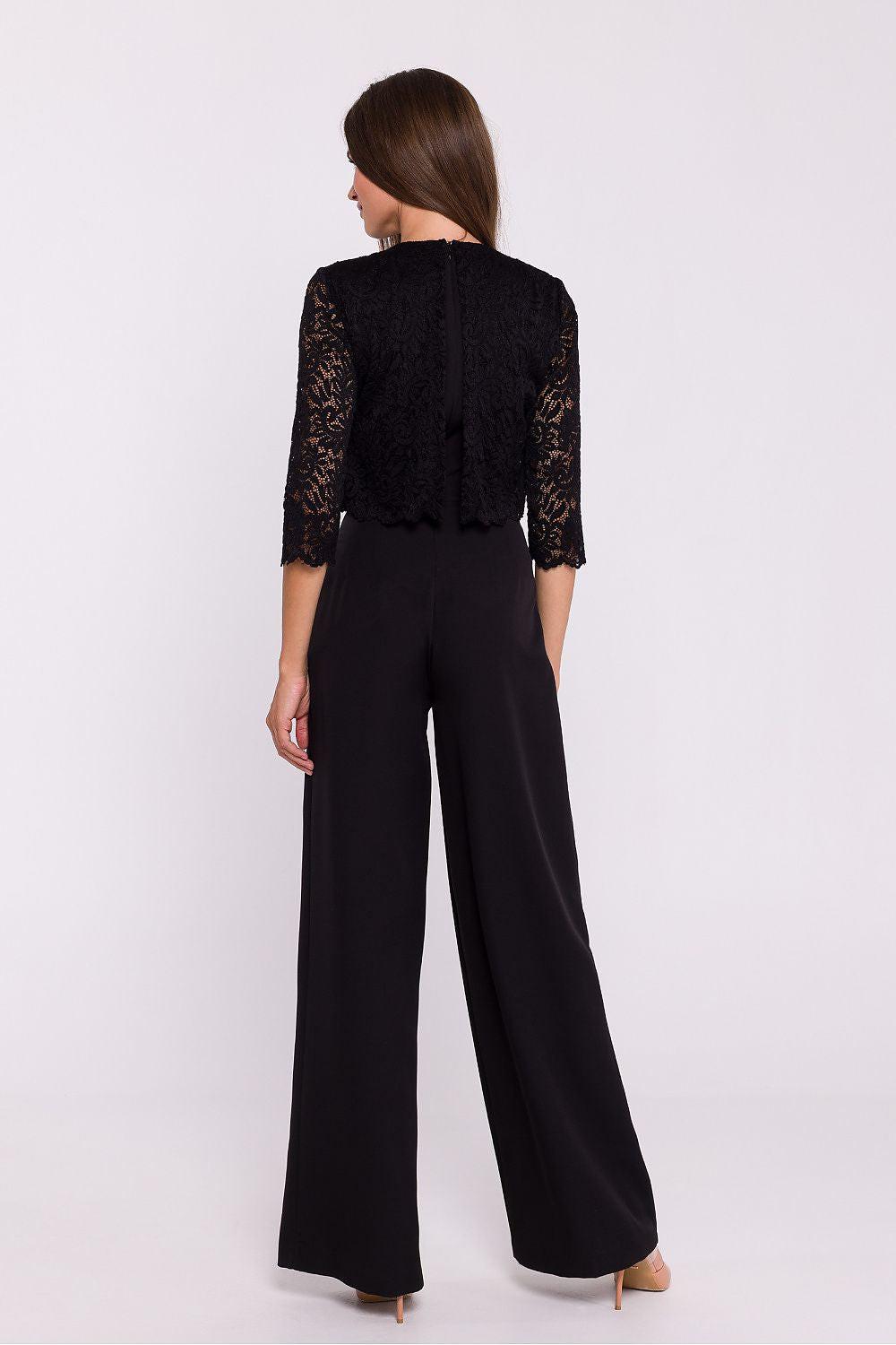 Black lace blouse and wide-leg trousers, back view, 3/4 sleeves