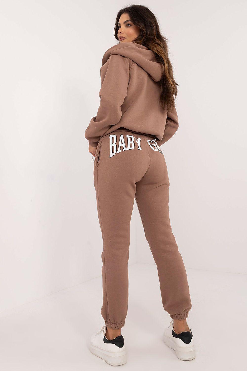 Brown two-piece hoodie and jogger set with hood and cuffed sleeves