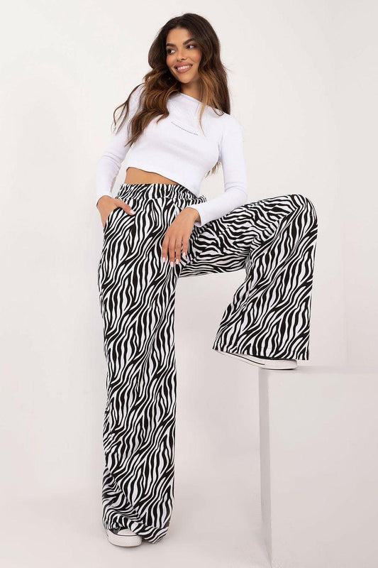 Women’s two-piece set with zebra-print wide-leg pants and white fitted top