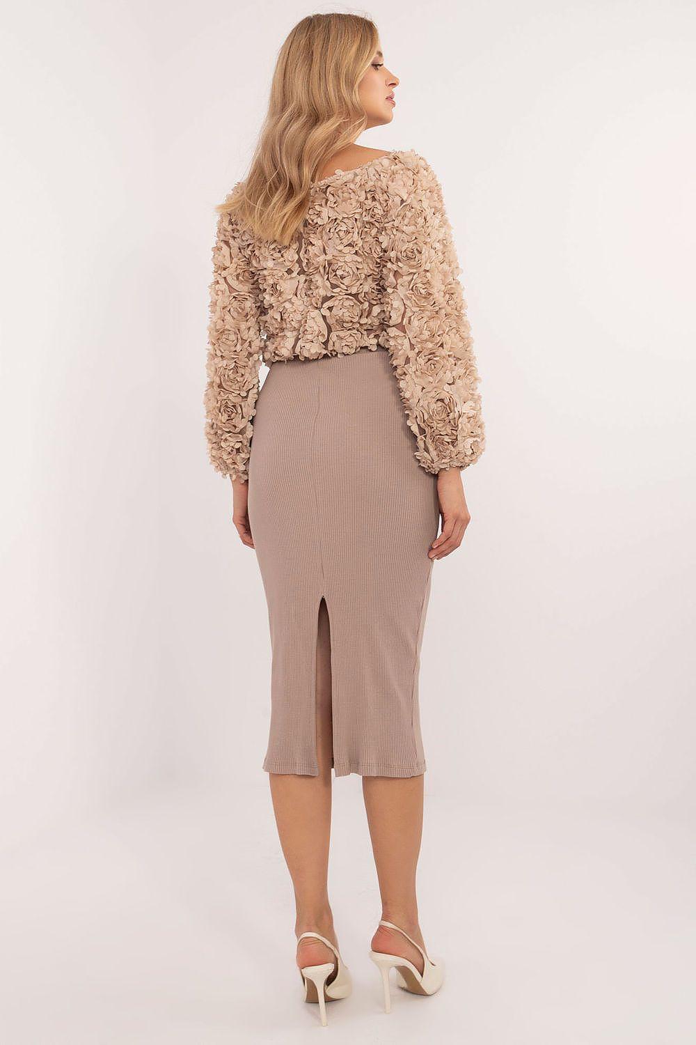 Beige ribbed midi skirt, back view with front slit and tapered fit
